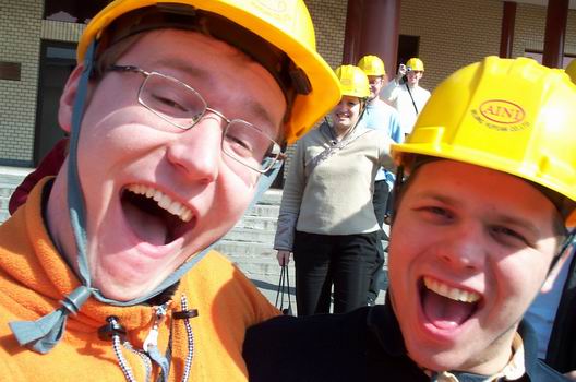 Me and Thomas smiling at the camera... I think we were extremely excited! It is not every day we get yellow helmets on;-)