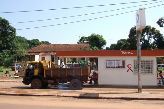 A Total gas station in the centre of Bissau not far form the harbor. Notice the red ribbon on the wall which is a symbol for solidarity with HIV-positive people and those living with AIDS. On the right of the ribbon there was some additional information about the disease written in Portuguese. This kind of information could be found all around the inner city. Unfortunately many people are illiterate, they cannot afford condoms and even if they could it is very hard to find places where you can buy them. If we also consider that men in this area have several wives and several lovers you suddenly have an escalating HIV problem in the country. In continuation of this no treatment is provided for HIV and AIDS patients in Guinea-Bissau - the country is simply bankrupt.